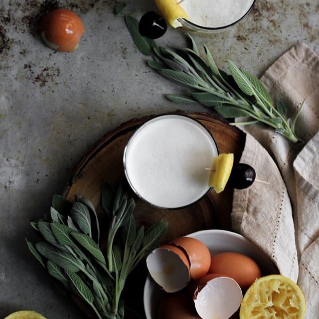 It's New Years Eve, Eve. And I've been so dang darn damn sick it's been balls. But I can see clearly now, the NyQuils gone, I can see all whiskeys in my way.... 🥃🥃🥃 I know I've been lacking lately in the Instagram community and im sorry for that. Some big shit has gone down and I'll explain it all in good time. But in the meantime, bourbon. Because tomorrow is motha' bugging New Year's Eve yo!! I'll be makin a few of these Cozy Maple Whiskey Sours. And by a few I mean looootttttssssss. Plans tomorrow?? 🍾💫🥂✨#whiskeyordie #whiskeygirl #imbibe 
Recipe
For the Sage Simple Syrup
1 C water
3/4 C pure maple syrup
1/2 C fresh sage leaves
For the Cocktail
2 1/2 shots bourbon whiskey
1 shot sage simple syrup
1 shot fresh lemon juice (approximately 1 juicy lemon)
1 egg white
Ice
For the Garnish
Lemon zest
Optional: Bourbon Soaked Cherries
Make the Sage Simple Syrup
Place all ingredients in a pot over medium-high heat on the stove. Bring to a boil, reduce the heat and simmer for 5 minutes. Remove from the heat and let cool. Strain into a clean non-reactive container (i.e. a mason jar) and keep for up to 1 week in the fridge.
Make the Cocktail
Place all ingredients into a cocktail shaker or mason jar. Cover tightly. Shake for 30 seconds as fast and as hard as you can. Be careful if using a mason jar that you don't break the glass with the ice.
Strain into rocks or coupe glasses and garnish with a strip of lemon zest and if using, a bourbon cherry.