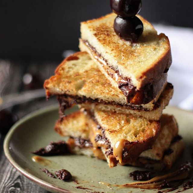 My Grilled Salted Dulce De Leche Chocolate Kahlúa Coffee Sammiches aren’t quite dessert; they aren’t quite a savoury dish. They are what some have termed “stoner food.” I like to call them dark and twisty late night snacks. They’re highly yum. Highly unhealthy. And addictive AF. I top them with a few of my bourbon soaked cherries because why the hell not. Amiright? Happy #Friyay y’all. 🤘🏻✨🥃 Full recipe in my cookbook, #CookingWithCocktails 🥂🍻🍷🥃🍹🍸